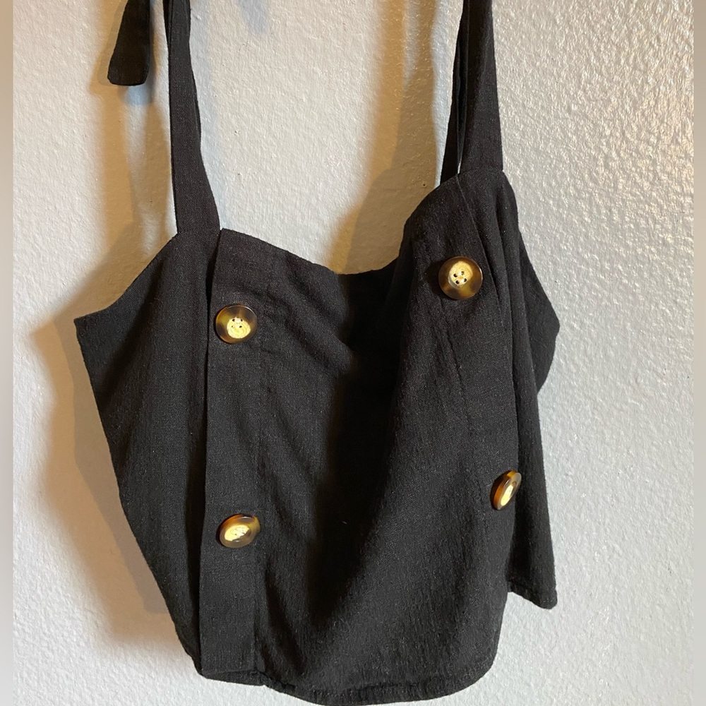 Black top with tie strap